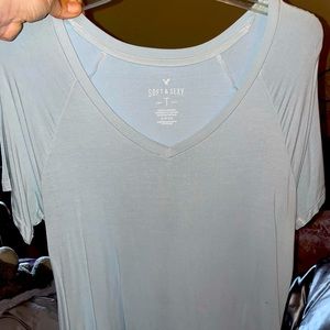 This a v-neck size small light blue